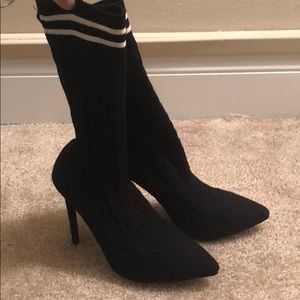 Black mid-rise sock booties